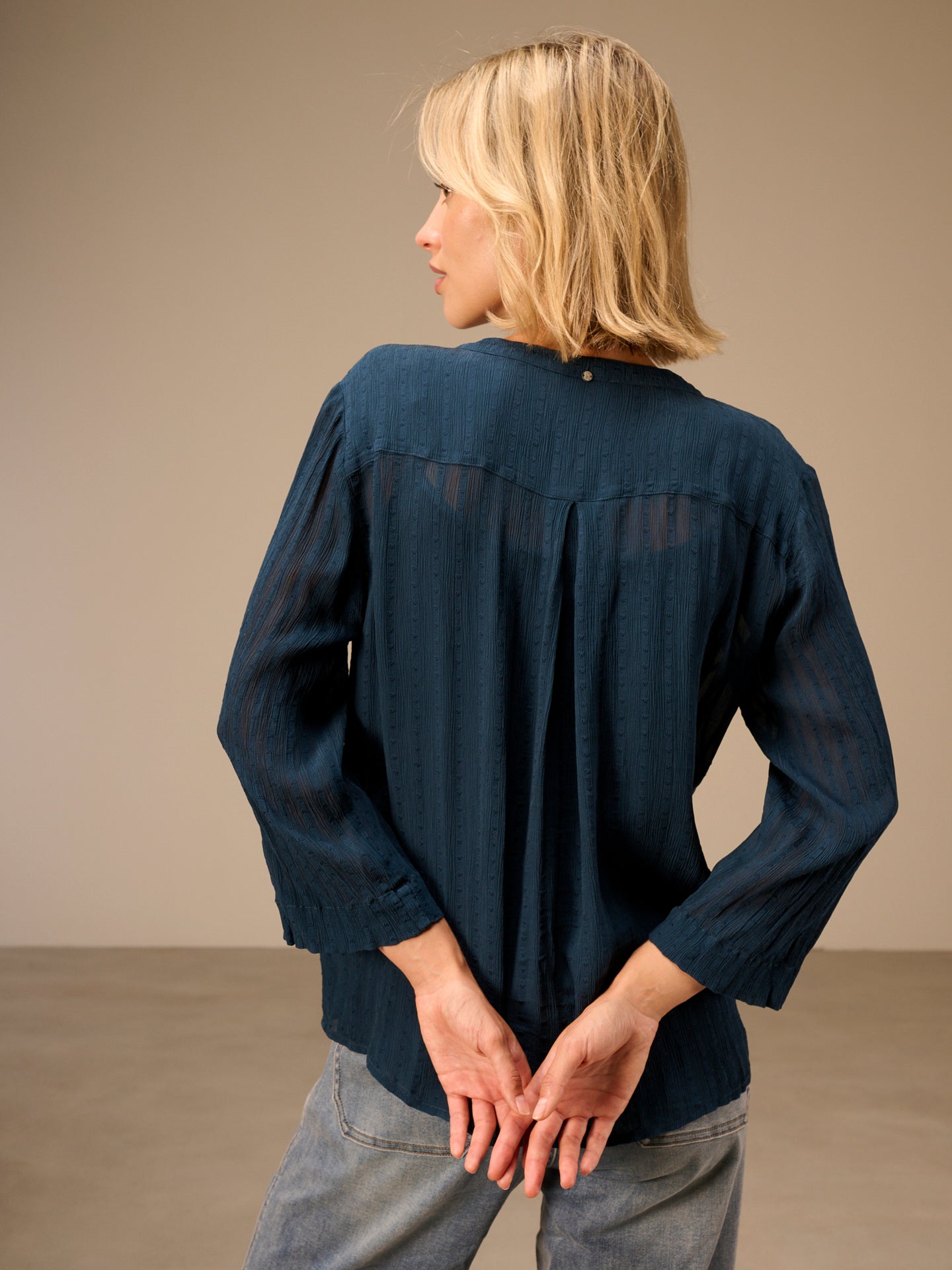 Blusa con scollo a V