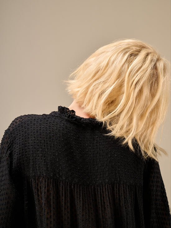 Blouse with ruffle detail
