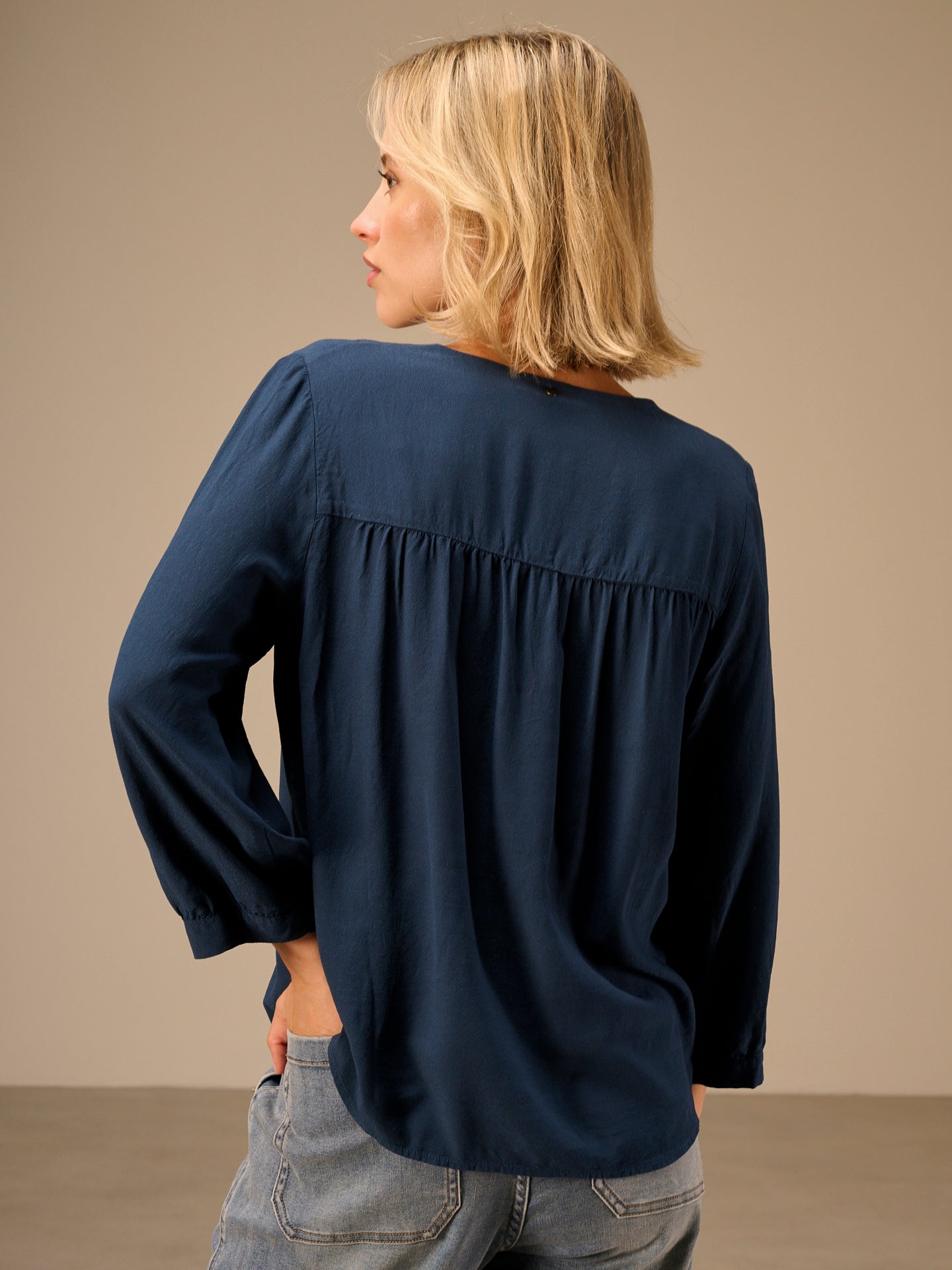 Blusa tinta unita