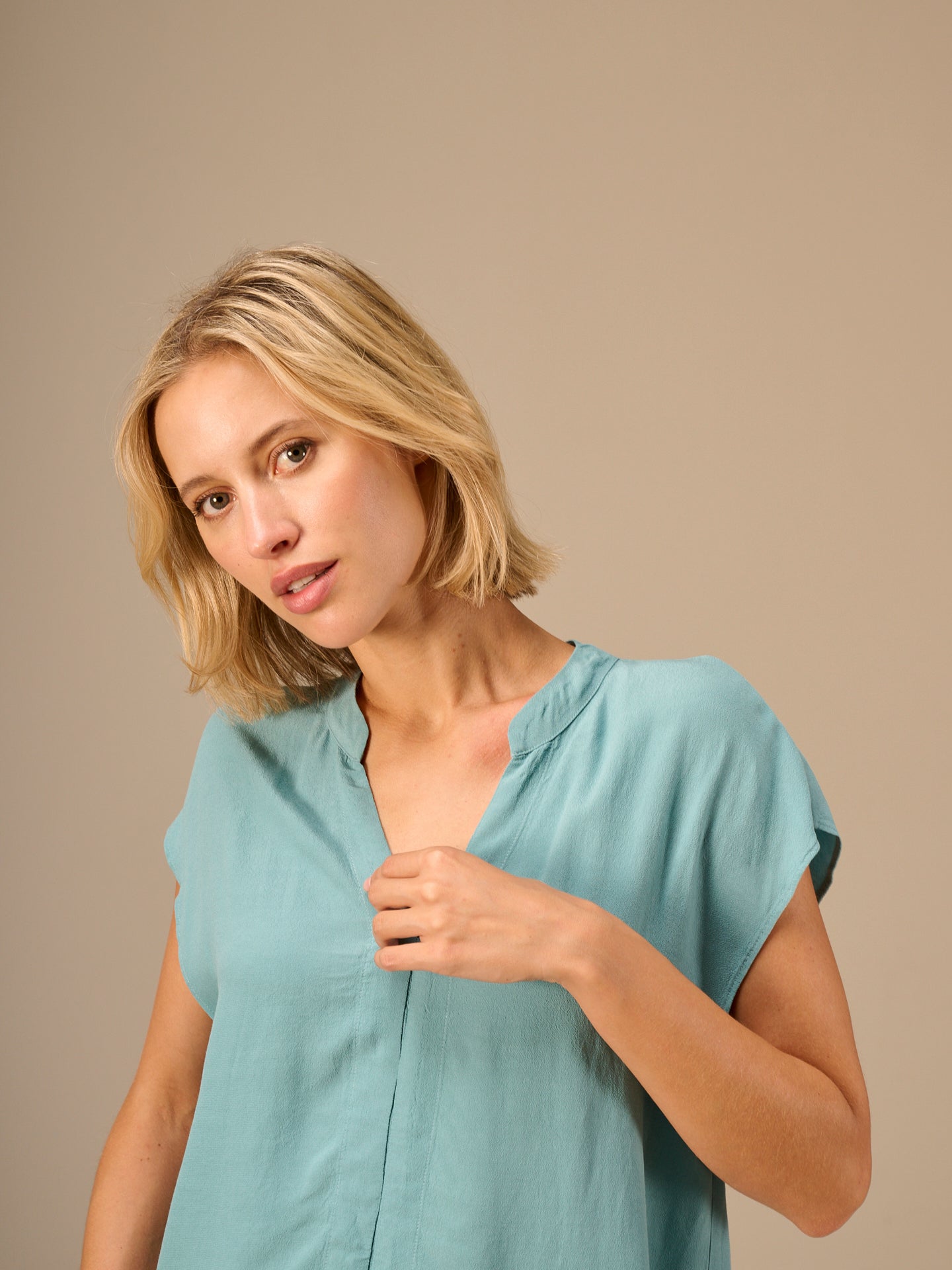 Blusa tinta unita