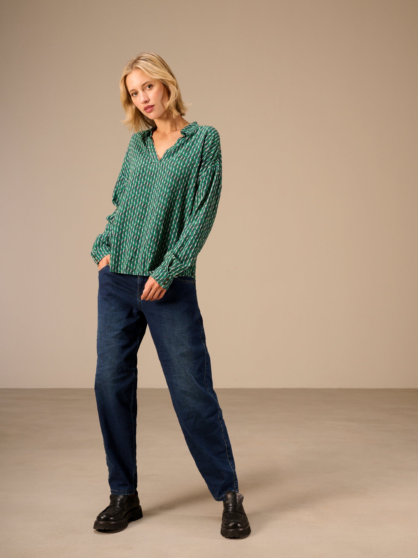 Blusa con maniche a 3/4