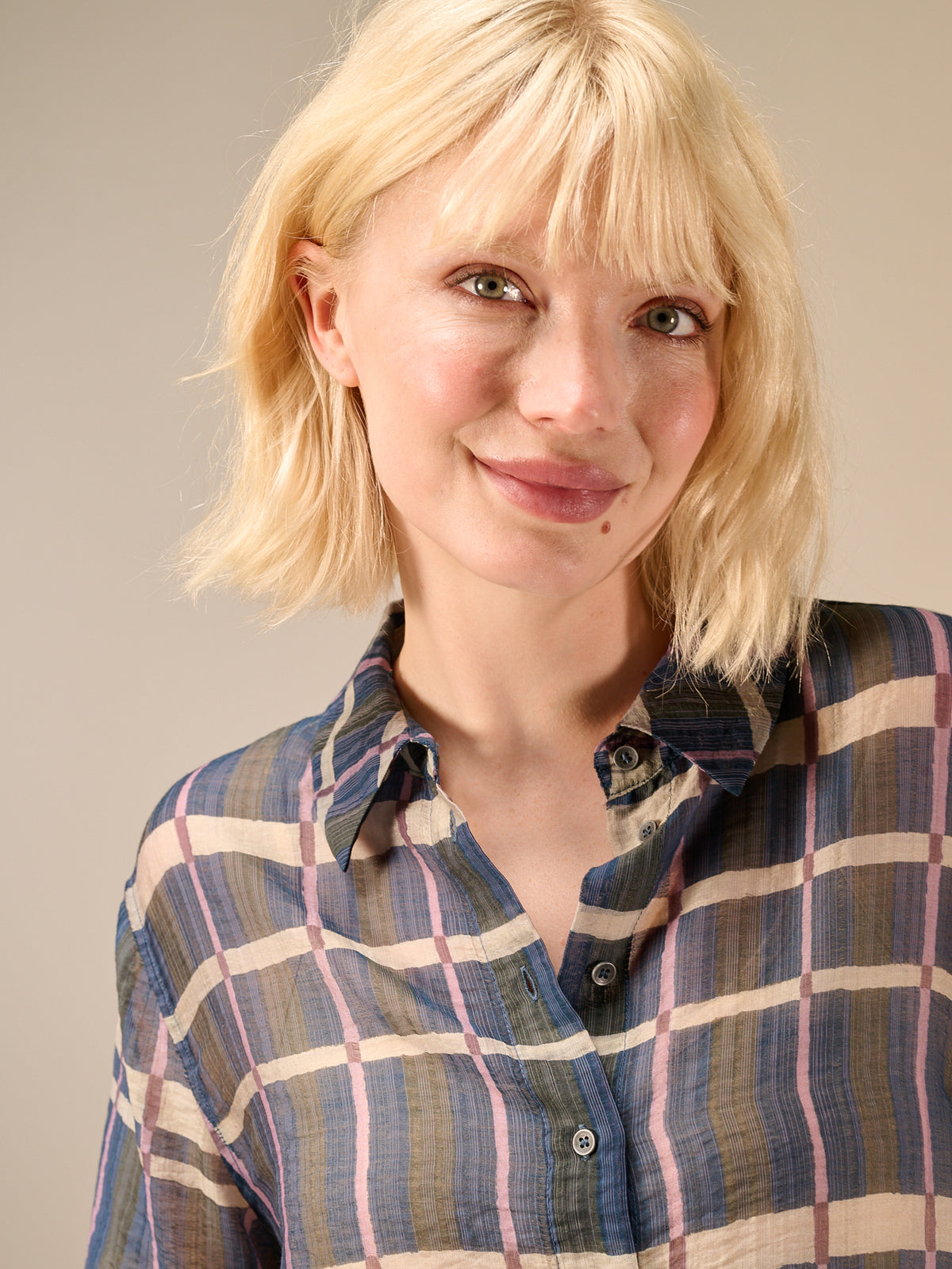 Blouse with check pattern