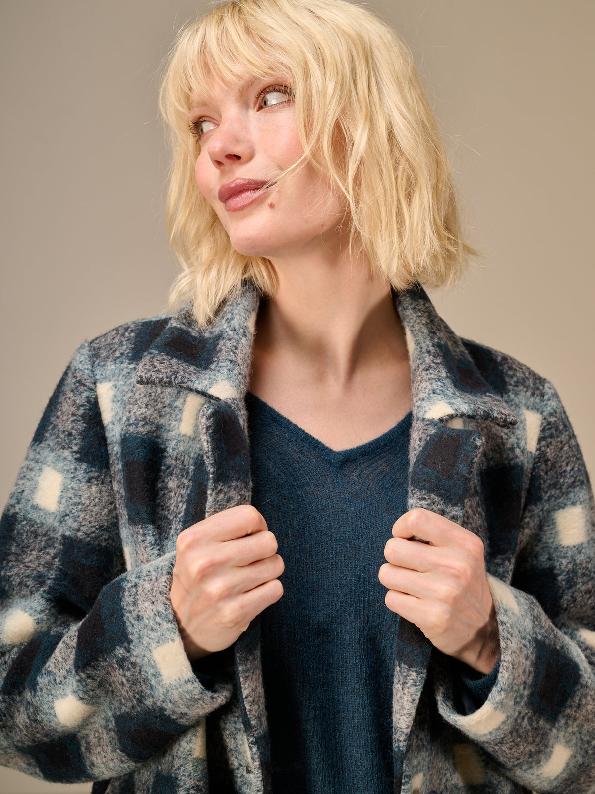 manteau avec motif à carreaux