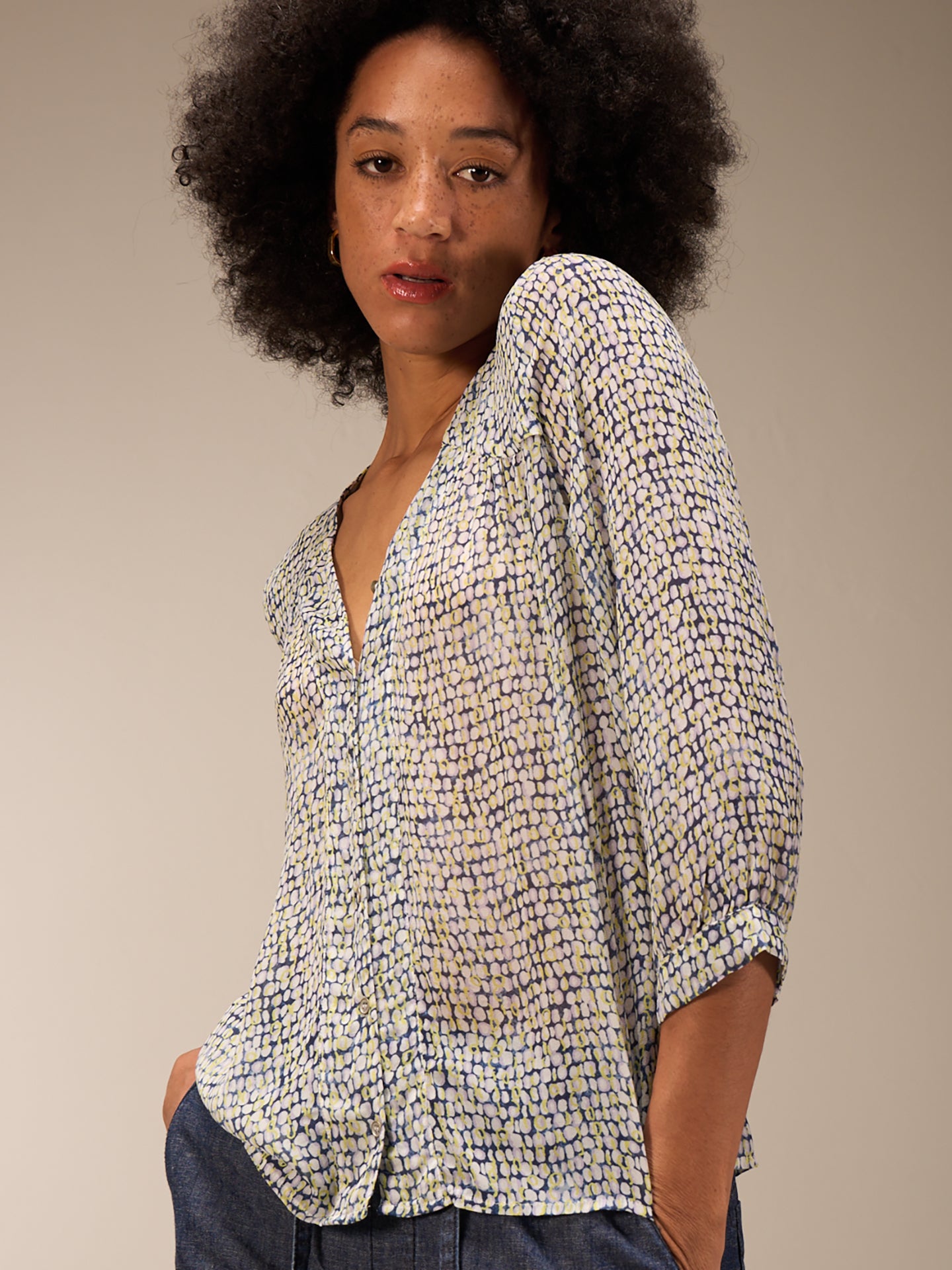 Blusa con abbottonatura