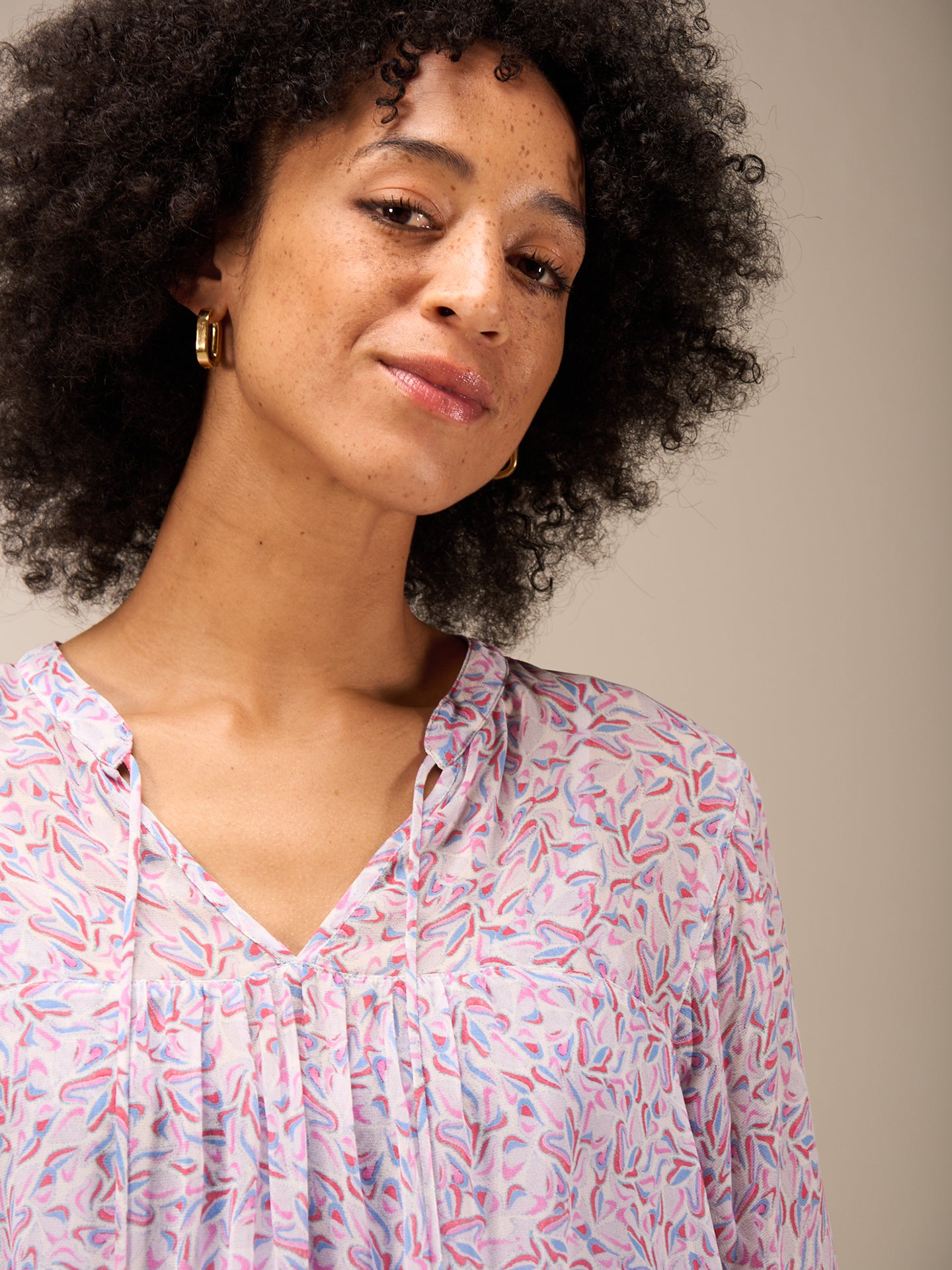 Blouse with flounce