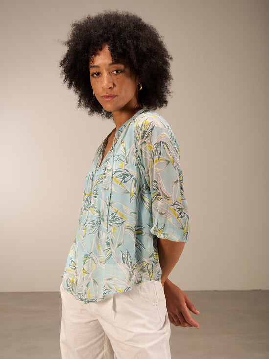 Blouse with flounce