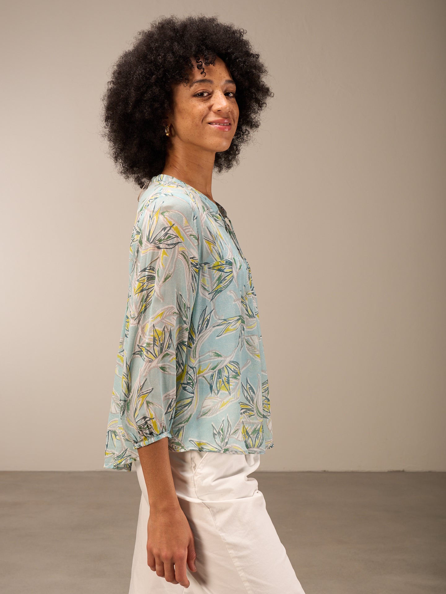 Blouse with flounce