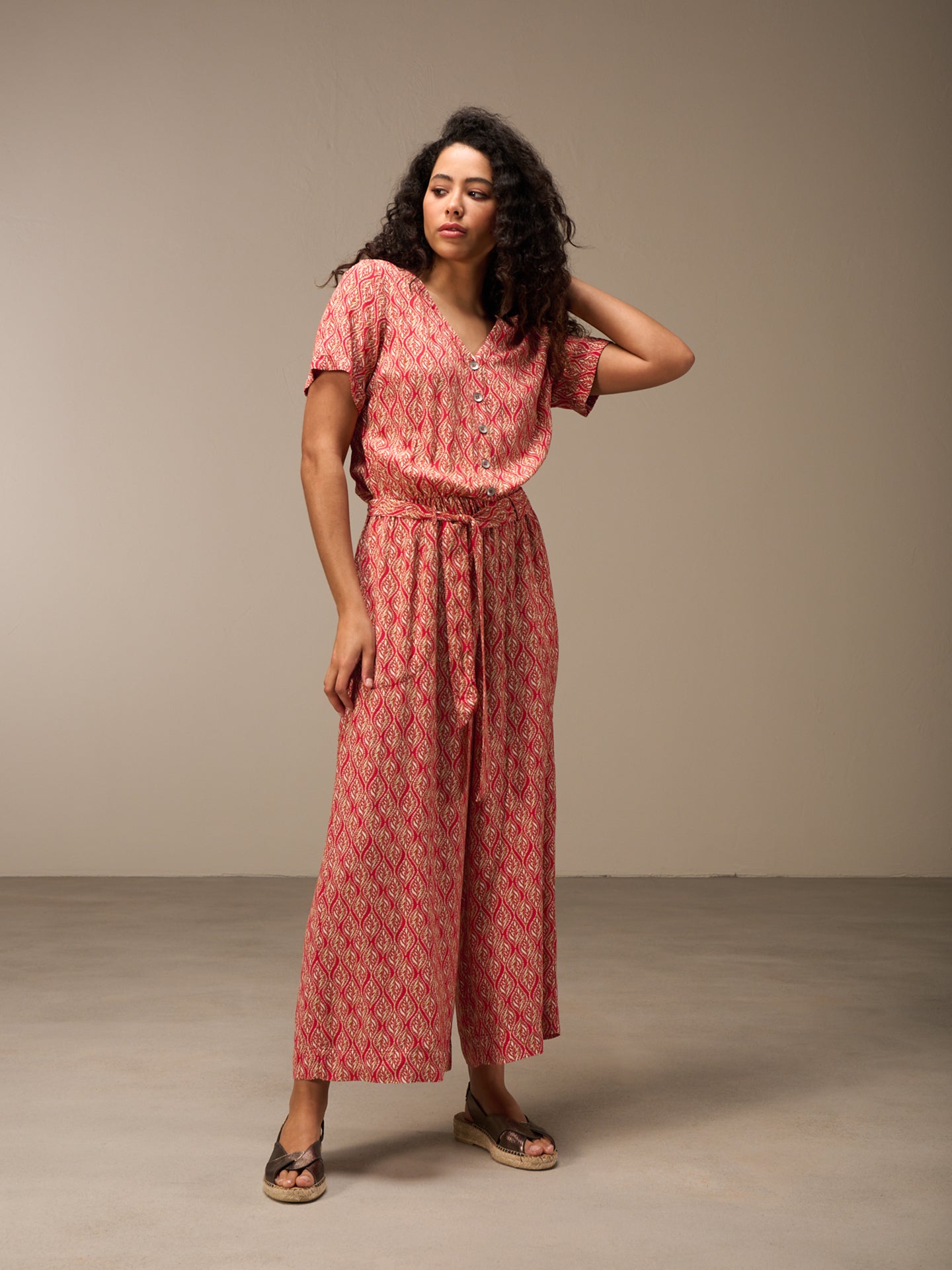 Tuta jumpsuit con scollo a V