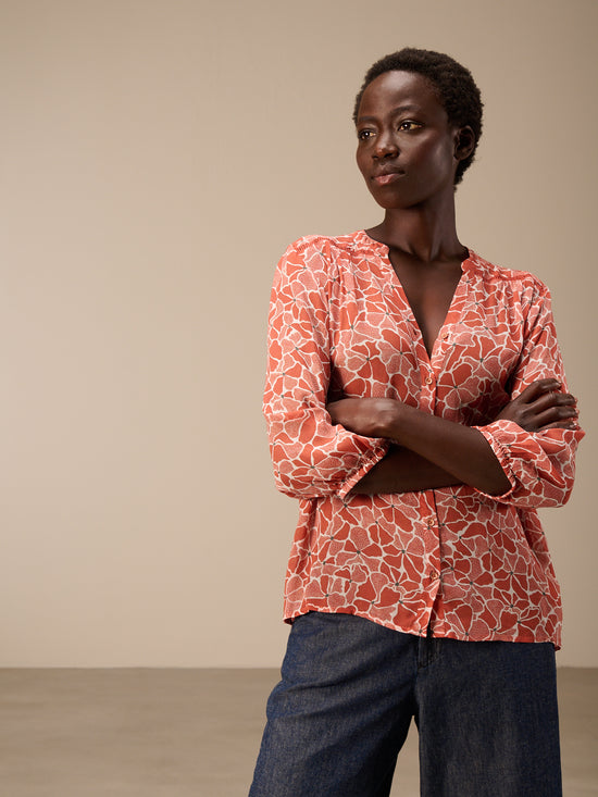 Blouse with button placket