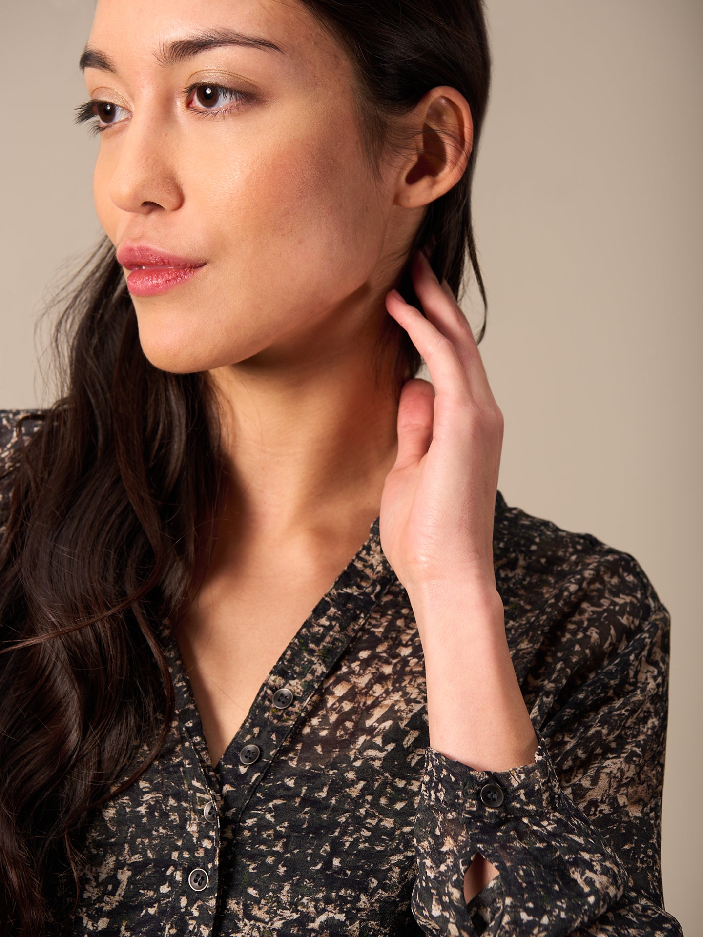 Blusa con abbottonatura