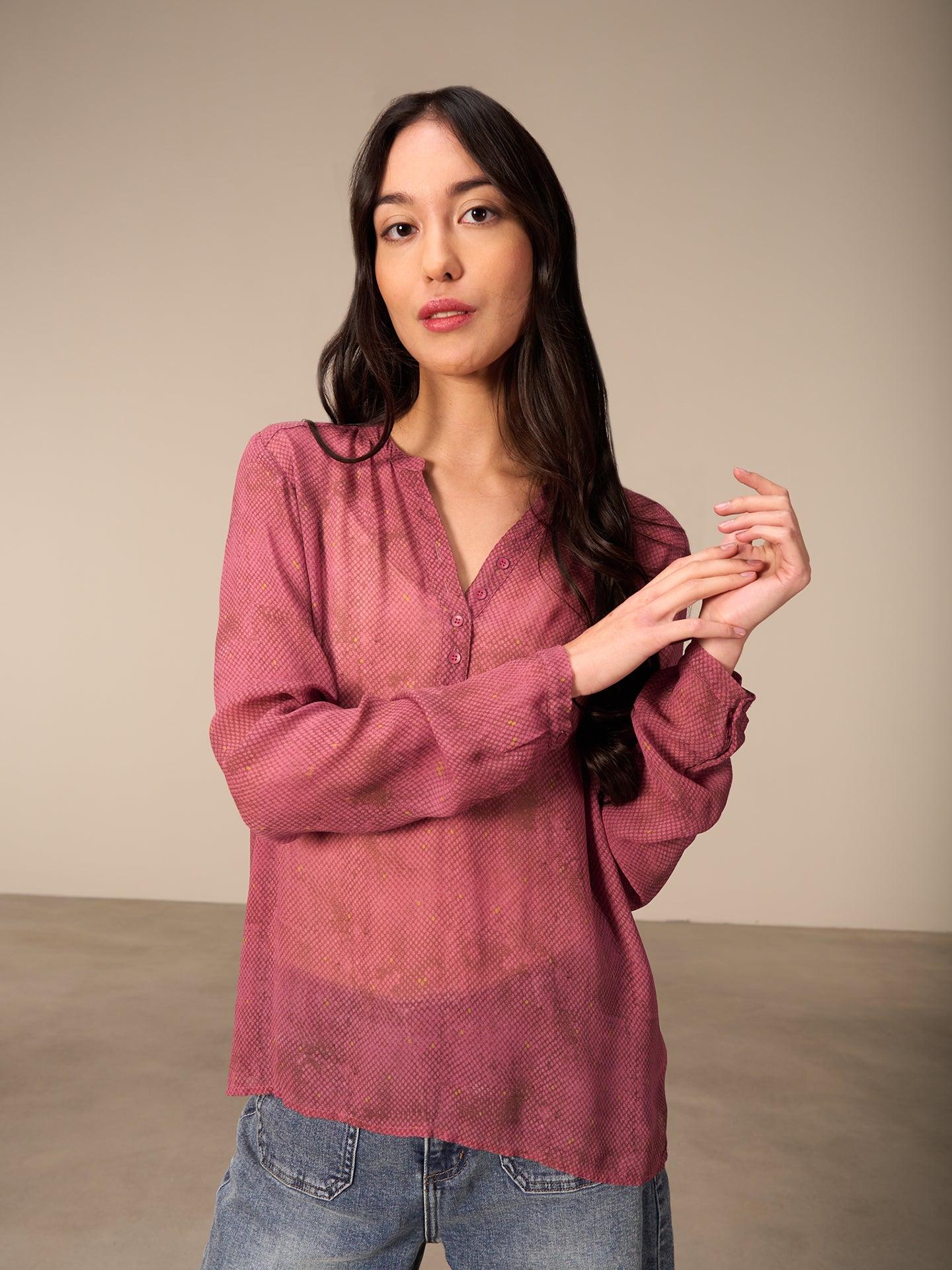 Blusa con abbottonatura