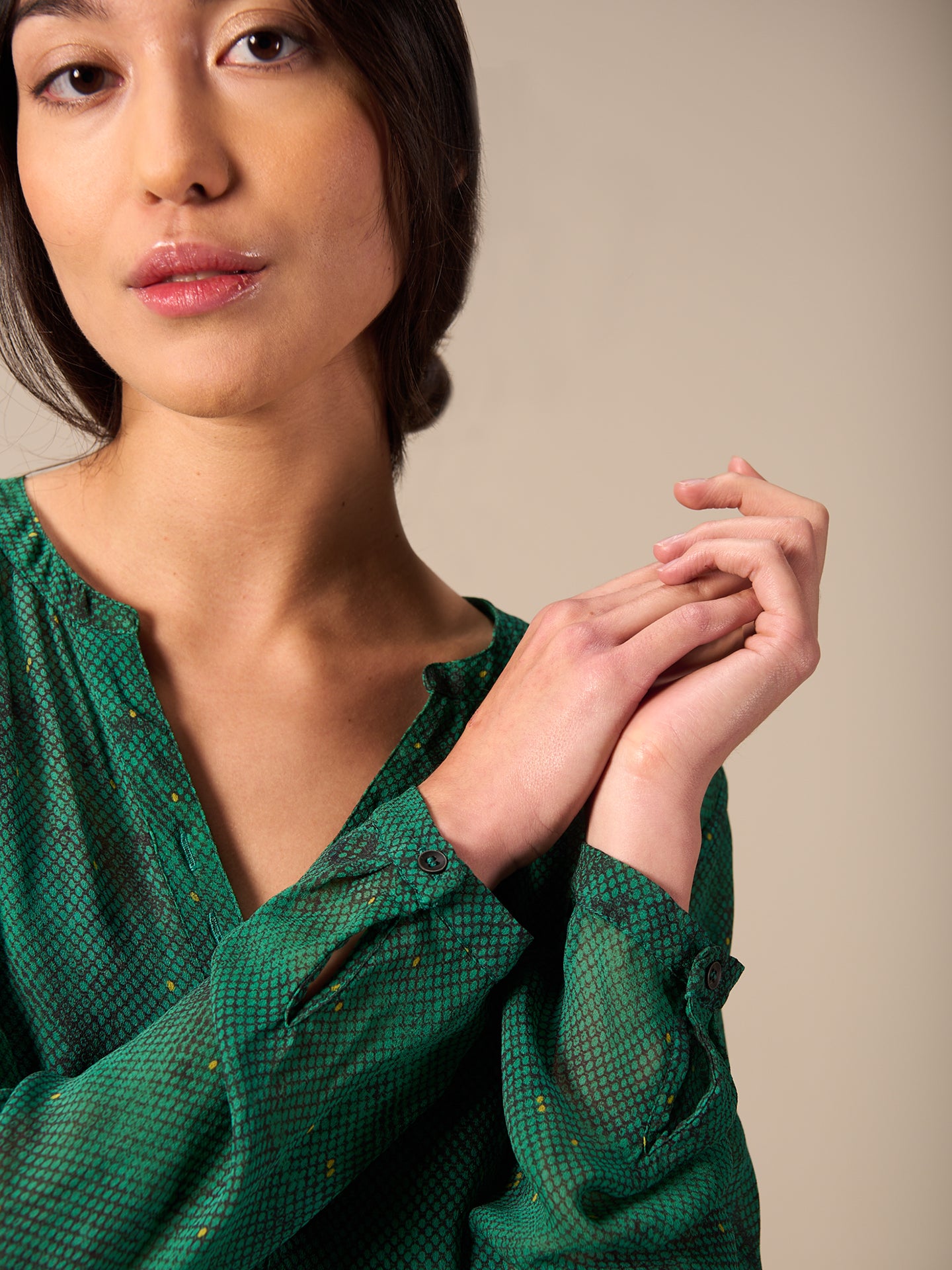 Blusa con abbottonatura